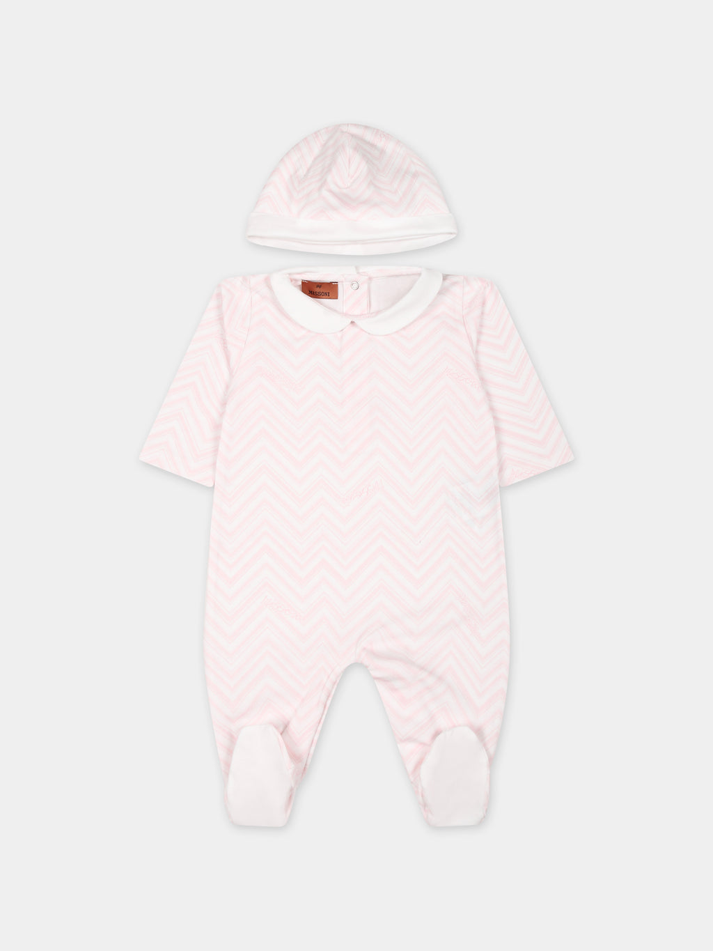 White suit for baby girl with chevron pattern
